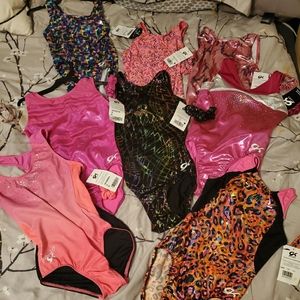 Gymnastics leotards 8- adult small and 4 adult med